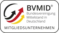The logo of the Federal Association of Medium-Sized Enterprises in Germany shows three arrows in black, red, and yellow pointing upward to the right, alongside the text 'BVMID Bundesvereinigung Mittelstand in Deutschland MITGLIEDSUNTERNEHMEN'.